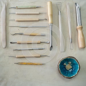 Pottery craft tools for sculpting clay art. View from above.