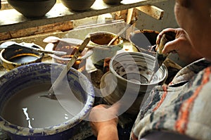 Pottery craftsman working