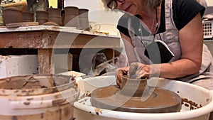 Pottery is a favorite pastime and relaxation Pleasure and joy Beautiful adult explored her woman sculpts a vase from