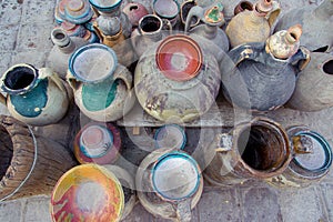 Pottery: plates, jugs, bowls, lids, vessels. Archaeological artifacts.