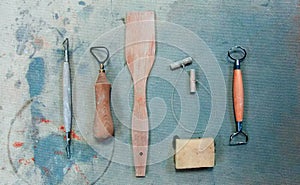 Pottery Tool Set on a Grunge Dirty Background. Top View. Toned Photo