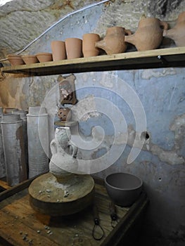 Pottery wheel with a jug. World War II bunker in Mosta,  Malta.