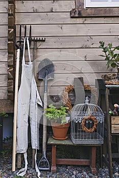 potting shed with gardening tools in summer.