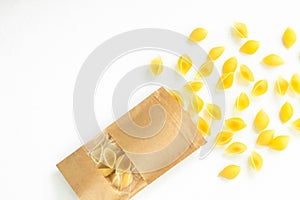 Pouch bag with pasta flatlay, top view. Packaging with transparent window isolated on white background