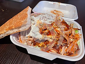 Poultry kebab box with salad and flatbread