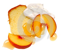 Pound cake with whipped cream and peaches