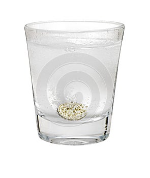 Pound coin like alka seltzer dissolving in glass i