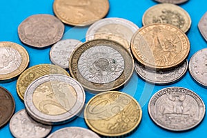 Pound coins on a blue background.