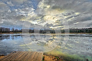 Pound with the sky reflected