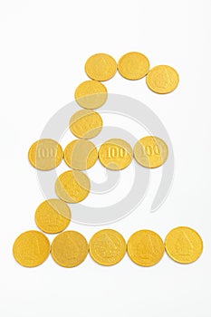 Pound sterling shape from gold coins