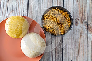 Pounded Yam and Garri Eba served with Egusi Soup ready to eat photo
