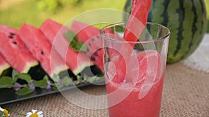 Pour delicious watermelon smoothie in a glass