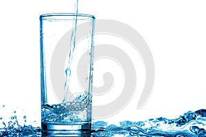 Pour drinking water into the glass