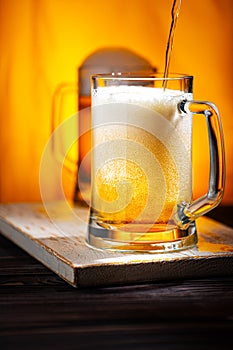 Pour Light Beer into Mugs