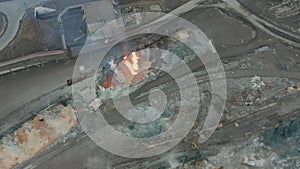 Pour molten slag from the diesel locomotive tank at a metallurgical plant. Aerial view