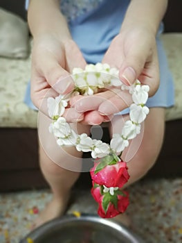 Pour water on the hands of revered elders and ask for blessing