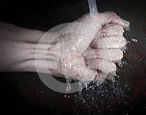 Poured water on fist