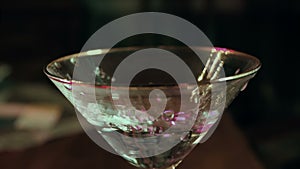 Pouring alcohol in martini glass