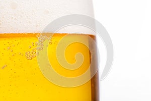 Pouring beer with bubble froth in glass for background