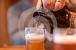 Pouring beer from a growler