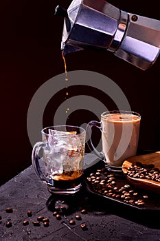 Pouring coffee into an iced filled glass