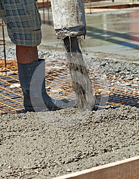 Pouring concrete at a construction site - closeup