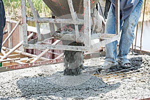 Pouring concrete works at construction site