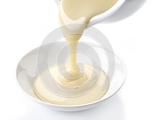 Pouring condensed milk photo