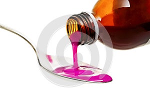 Pouring cough syrup