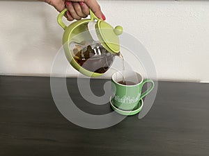 Pouring a cup of tea