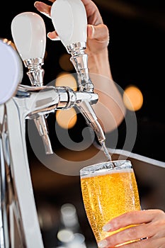 Pouring a Draft Blonde Beer from the Tap