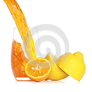 Pouring fresh orange juice into a glass