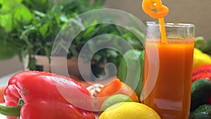 Pouring fresh vegetable smoothie into a tall glass