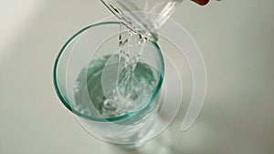 Pouring glass of water