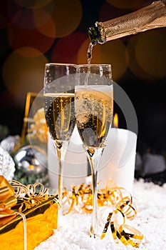 Pouring glasses of festive champagne