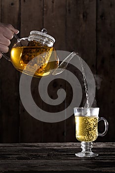 Pouring Hot Chamomile Tea