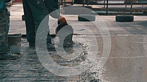 Pouring, Laying Concrete at the Construction Site using Buckets of Cement.