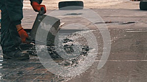 Pouring, Laying Concrete at the Construction Site using Buckets of Cement.