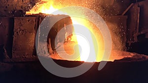 Pouring of liquid metal from open-hearth furnace