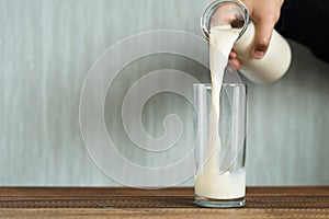 Pouring milk into a glass