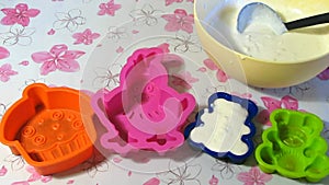 Pouring Milk Jelly Into Molds.