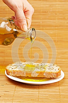 Pouring olive oil