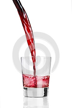Pouring a red beverage