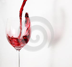 Pouring red wine