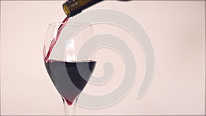 Pouring Red Wine Into A Glass