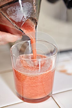 Pouring tomato juice