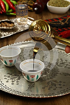 Pouring turkish coffee