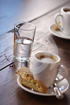 Pouring water and espresso