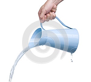 Pouring water from kettle photo