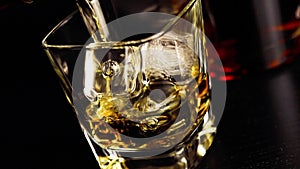 Pouring whiskey on bar table lounge bar atmosphere